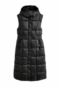 Стеганый жилет