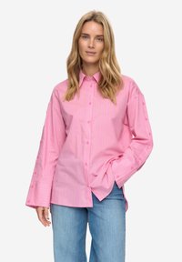 Длинная блузка