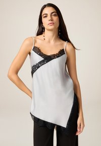 Длинный топ Длинный топ