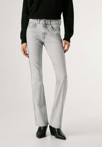 Клешеные брюки