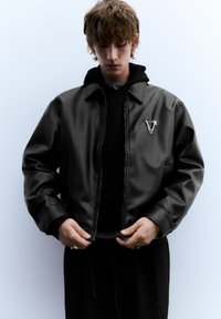 Кожаная куртка