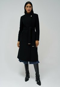 Шерстяное пальто