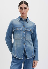 Джинсовая куртка