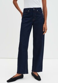 Свободные джинсы