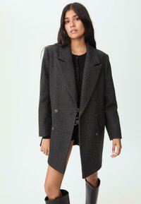 Шерстяное пальто