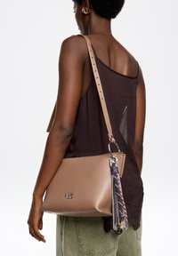 Сумка через плечо