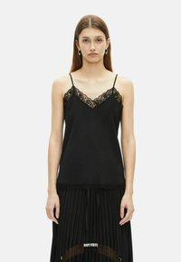 Топ на бретельках