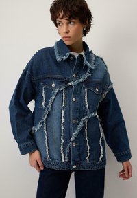 Джинсовая куртка