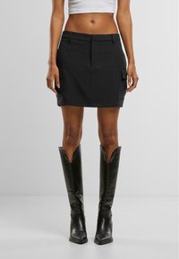 Юбка с накладными карманами