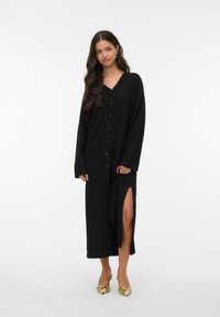 Вязаное платье