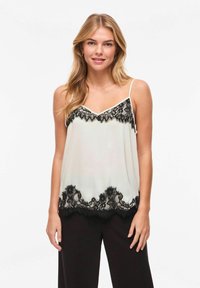 Топ на бретельках