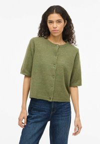 Вязаный жилет