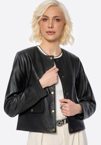 Кожаная куртка