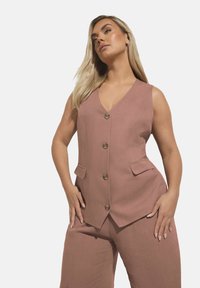 Джинсовая жилетка