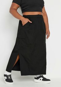 Юбка с накладными карманами Юбка с накладными карманами