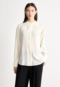 Шелковая блузка