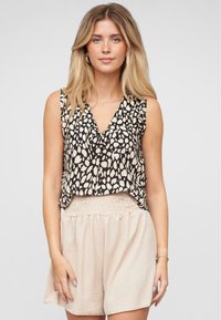 Блузка без рукавов