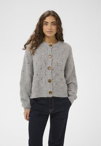 Вязаная кофта