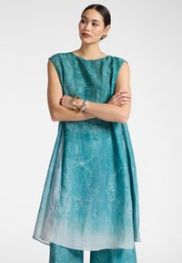 Длинный топ