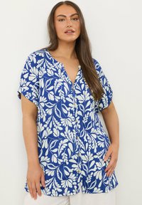 Длинная блузка