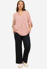 Длинная блузка