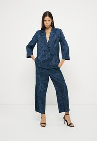 Блейзер Блейзер