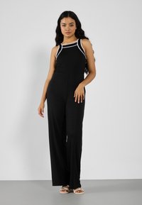 Джинсовый комбинезон