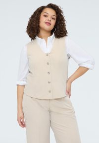 Жилет Жилет