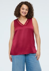 Длинный топ