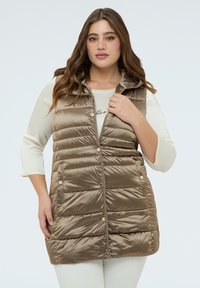 Стеганый жилет Стеганый жилет