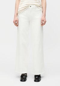 Джинсы бойфренда