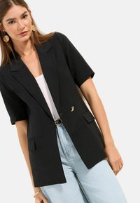 Длинный блейзер