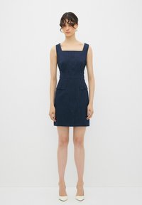 Джинсовый комбинезон