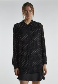 Длинная блузка