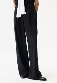 Брюки Брюки