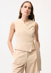 Жилет Жилет