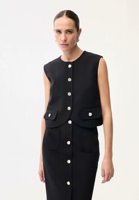 Жилет Жилет