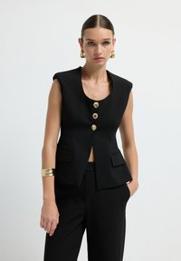 Жилет Жилет