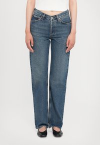 Джинсы бойфренда