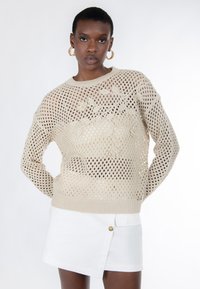 Вязаная кофта