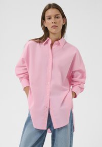 Длинная блузка