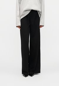 Широкие брюки Широкие брюки