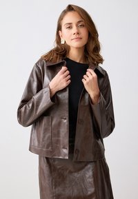 Кожаная куртка