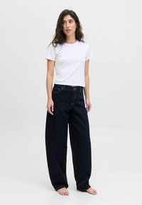 Свободные джинсы Свободные джинсы