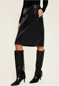 Кожаная юбка Кожаная юбка