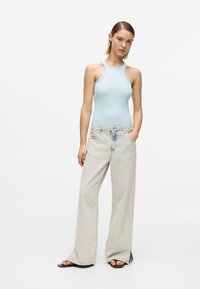 Свободные джинсы Свободные джинсы