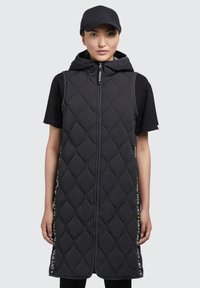 Стеганый жилет Стеганый жилет