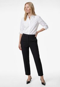 Узкие брюки