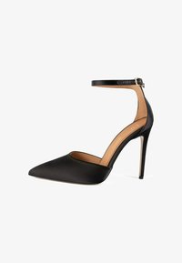 Туфли на высоком каблуке Туфли на высоком каблуке