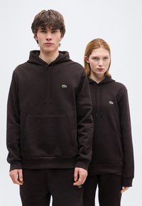 Пуловер с капюшоном